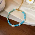 Vue détaillée d'un élégant bracelet en perles d'aigue-marine et perles blanches - Bracelet Perles Aigue-marine (8#)