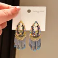 Detailed view of colorful teardrop earrings with shimmering rhinestones and tassels - Water Drop Tassel Style (1#)