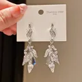 Detailed view of silver-toned drop earrings with zircon leaf and teardrop design - Water Drop Zirconia Streamline Style (6#)