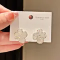 Detailed view of vintage four-leaf clover stud earrings in 316L stainless steel material - Vintage Lace Four-Leaf Clover Style (21#)