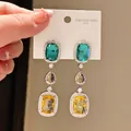 Elegant vintage stainless steel drop earrings with vibrant multi-color zircon crystals. - Three-Color Zirconia Pendant Style (30#)