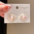 Vintage 316L stainless steel stud earrings with elegant pink pearl in spiral cage - Spiral Flower Pink Pearl Style (32#)