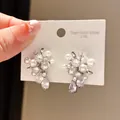 Vintage silver-tone flower stud earrings with shimmering pearls and cubic zirconia - Floral Clustered Pearl Style (43#)