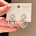 Elegant heart-shaped stainless steel earrings inlaid with sparkling cubic zirconia - Hollow Heart Zirconia Style (45#)