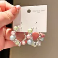 Pastel multi-color pearl hoop earrings with crystal accents on a 316L steel display card - Macaron Pearl Hoop Style (64#)