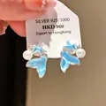 Elegant silver mermaid tail earrings featuring blue starfish and pearl accents - Fish Tail Starfish Pearl Style (66#)