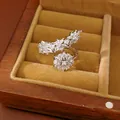 Exquisite silver-tone V-shaped flower ring with brilliant cubic zirconia in a velvet box - Floral Style Ring