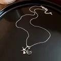 Collana con ciondolo a stella marina e perla in resina vista da vicino - Stile Stella Marina (6259025846195) / Argento