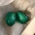 Detailed view of French vintage emerald green jelly bubble effect resin stud earrings - Green