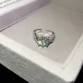 Close-up of 14k gold plated geometric open ring with sparkling zircon in a gift box - Large Main Stone Style / Silver