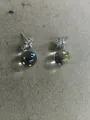 Silver stud earrings with transparent glass balls featuring colorful polka dots - Cross Style