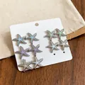 Vista detallada de pendientes de estrella de mar de esmalte sobre una tarjeta blanca - 17# Plateado Multicolor (Juego de 5 Pares)