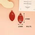 Detail view of rugby ball alloy pendants with dimensions 47mm x 25mm and 6.7g weight - 3 Rugby