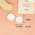 Detailed macro shot of white golf ball alloy pendant with 39mm height and 6.3g weight - 5 Golf