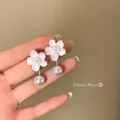 Detail of pink cherry blossom earrings with elegant pearl drop tassels - Dual-Wear Cherry Blossom Pearl / Silver Earring Post - Silver - Pink