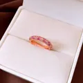 Exquisite macro view of French vintage style ring featuring pink and white zircon stones - Rose Gold