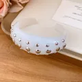 Modern white resin open cuff bracelet featuring polished silver metal studs for women - Bangle / Off White