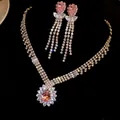 Luxury close-up of a pink pear-shaped zircon necklace and earrings jewelry set for women - Necklace - Silver - Pink
