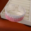 Elegante bracciale elastico a più strati con strass sfumati dal chiaro al rosa - Sfumatura Rosa Argento
