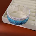 Bracciale rigido multistrato con strass, sfumatura blu e design aperto elastico chic - Sfumatura Blu Cielo Argento
