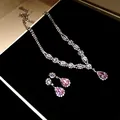 Detailed view of elegant necklace and earring set featuring pink teardrop zircons - Silver-Pink