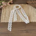 Elegant white floral lace ribbon scarf displayed on a rustic straw mat with flowers - Connected Flower (Style 4) / White