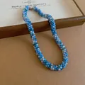 Hand-woven blue and white crystal beaded necklace featuring sparkling faceted glass beads - Necklace / Blue-Grey