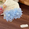 Macro detail of sky blue beaded flower earrings featuring elegant pearl centers - Silver Earring Post-Blue