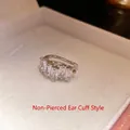 Elegant silver-colored ear cuff featuring five rectangular baguette zirconia stones. - Baguette Zirconia Row Style (Style 3) / Single Piece / Silver