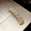 Close-up of elegant multi-layer pearl bracelet with zircon flower accents in a jewelry box - Multilayer Beaded Floral Style (HB5910) / Gold
