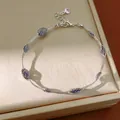 Elegante zilverkleurige armband met paarse zirkonia in gaas, minimalistische luxe sieraden - Zilver-Paars