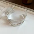 Detailed close-up of a silver metal leaf texture cuff bracelet with vintage design - Brushed Leaf Vein Style (12#)