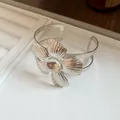 Detailed macro view showing the intricate leaf pattern on silver flower cuff bracelet - Brushed Floral Style (10#)