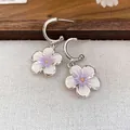 Eleganti orecchini a cerchio a C in argento con delicati fiori in smalto viola - Viola