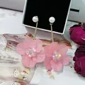 Sweet vacation style long drop earrings with pink acrylic flowers and crystal centers - Pink