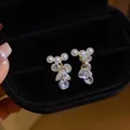 Close-up of elegant French style pearl earrings with sparkling cluster zircon tassels - Gold-White (Pearl Tassel Style)