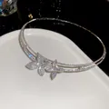 Macro view of a luxury double-layer necklace encrusted with sparkling rhinestones - Choker Necklace / Silver