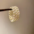 Close-up of multi-layer gold ring with pearls and sparkling rhinestones - 4# Bangle-Gold
