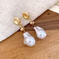 Elegant Baroque pearl drop earrings with gold-tone knot detail and vintage style - Gold-White (HE33543)