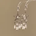 Detailed view of silver starfish dangle earrings featuring elegant pearl tassels and drop charms. - Starfish Tassel / Silver White