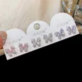 Detailansicht von Zirkon Schmetterling Ohrsteckern in Pink, Weiß und Lila. - 6-Teiliges Set / Silber/Rosa