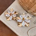Elegant gold and white metal flower stud earrings with a refined minimalist design - Silver Pin Flower Style (HE33090) / Gold, White