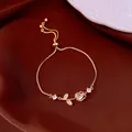 Elegant gold rose charm bracelet with sparkling clear stones and adjustable box chain - No 11 Rose Adjustable Style