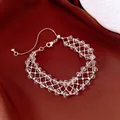 Elegant silver-toned beaded lattice bracelet with sparkling clear faceted crystal drops - No 17 Clear Waterdrop Style