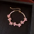 Elegant gold-tone bracelet with pink water-drop crystal flowers in a box - No 29 Pink Five-Petal Flower Style