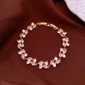 Elegant gold-tone bracelet featuring pink and white marquise crystals on brown silk fabric - No 34 Pink White Marquise Wreath Style