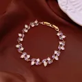 Elegant gold bracelet with purple and white marquise-cut crystals on brown silk fabric - No 35 Purple White Marquise Splicing Style