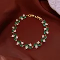 Luxury gold-tone bracelet featuring green and white marquise-cut crystals on silk - No 36 Green White Marquise Splicing Style
