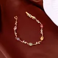 Dopamine-style bracelet featuring colorful sparkling gemstones with a gold-tone chain. - No 45 Dopamine Multicolor Gem Style