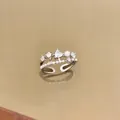 Close-up of a silver open ring featuring heart zircon, pearls, and starburst accents. - Heart Starry Pearl Adjustable Ring / Silver